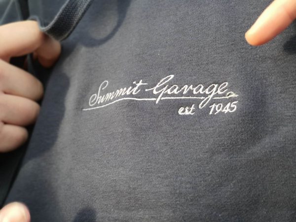 Logo close-up of the ‘Original’ Summit Garage Hooded Sweatshirt