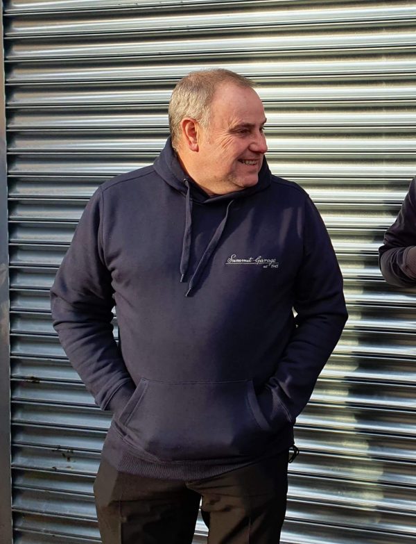 John Newey wearing the ‘Original’ Summit Garage Hooded Sweatshirt